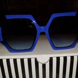 Overized blue sunglasses
